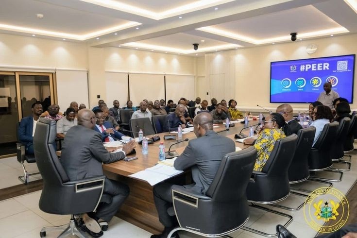 A Nigerian health ministry official presenting the national digital health strategy implementation framework to state health directors at a federal-state health coordination meeting