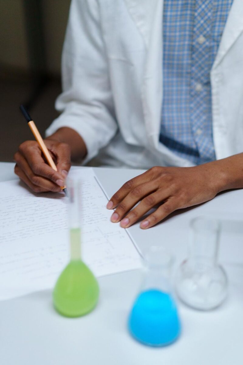 Nigerian STEM students conducting practical laboratory or fieldwork research at a university or technical institution as part of a national talent pipeline development programme